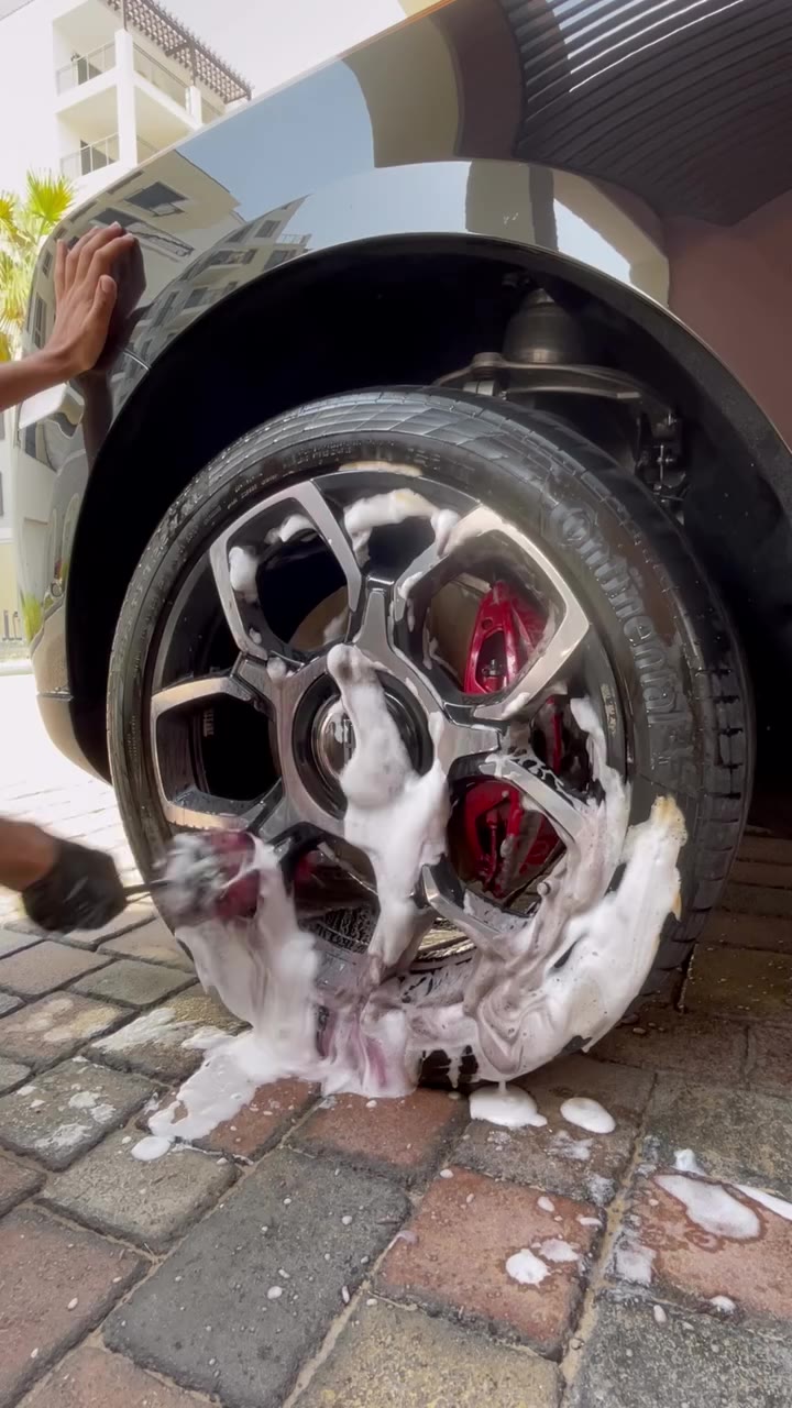 Foam working across a Rolls-Royce wheel during a real Detail Boss deep clean